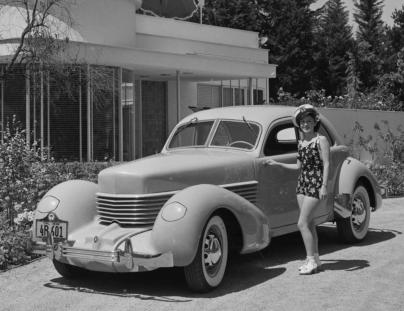 Jeanette Cernitz beside a Cord 810, circa 1938